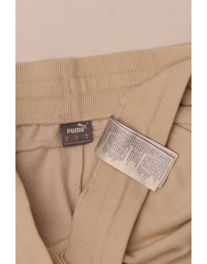 Męskie spodnie dresowe Puma Joggers w kolorze średniego beżu, bawełny