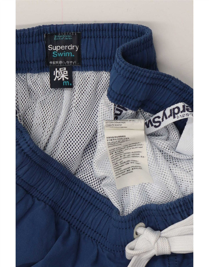 Męskie spodenki kąpielowe Superdry z grafiką, średniej wielkości granatowe, bawełniane z blokami kolorów