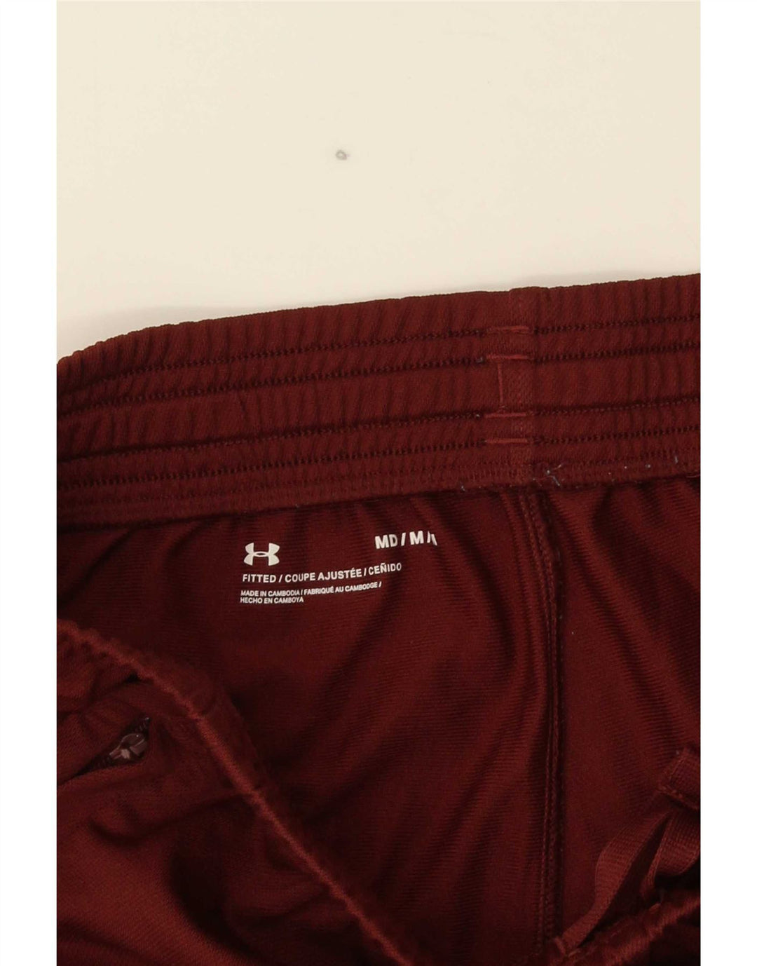 Męskie dopasowane spodnie dresowe Under Armour w kolorze średniego burgunda
