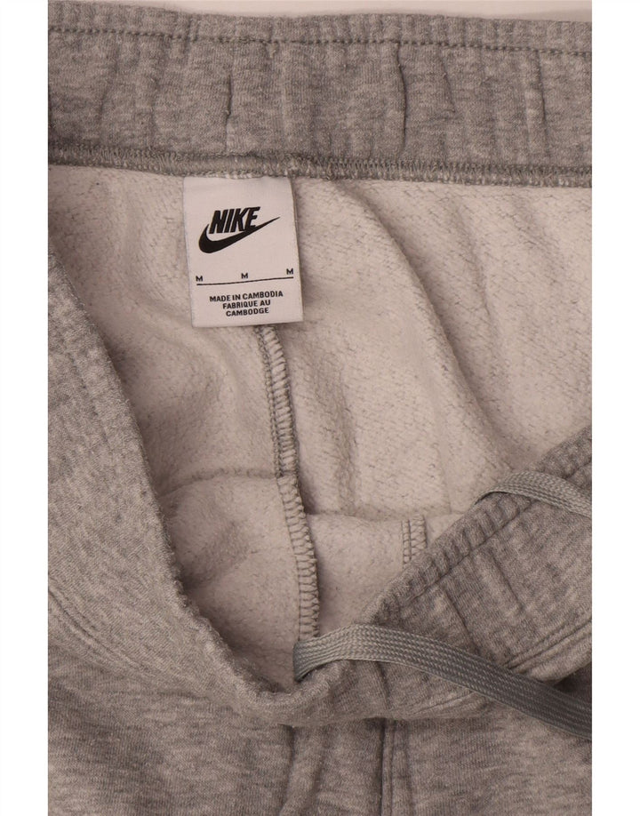 Męskie spodnie dresowe NIKE Graphic Cargo, bawełna w kolorze średniej szarości