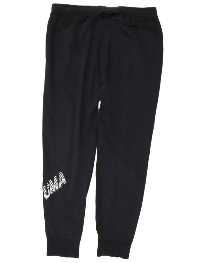 Męskie spodnie dresowe Puma Graphic Joggers XL czarne