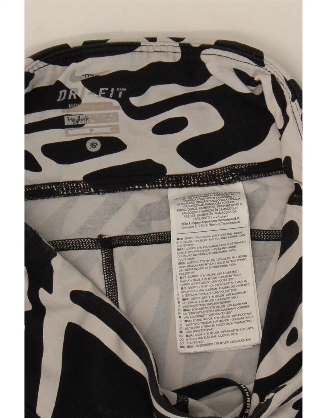 Damskie legginsy NIKE Dri Fit z abstrakcyjnym wzorem UK 8, małe, z czarnego nylonu