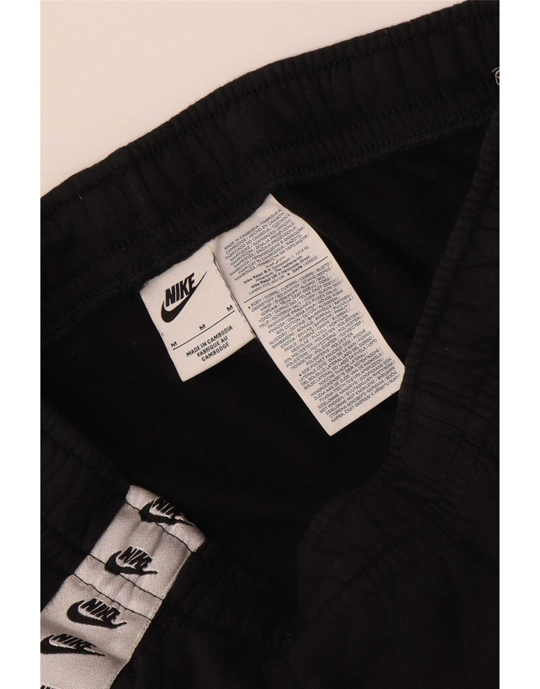Męskie spodnie dresowe Nike Graphic Tracksuit Joggers w kolorze średniej czerni