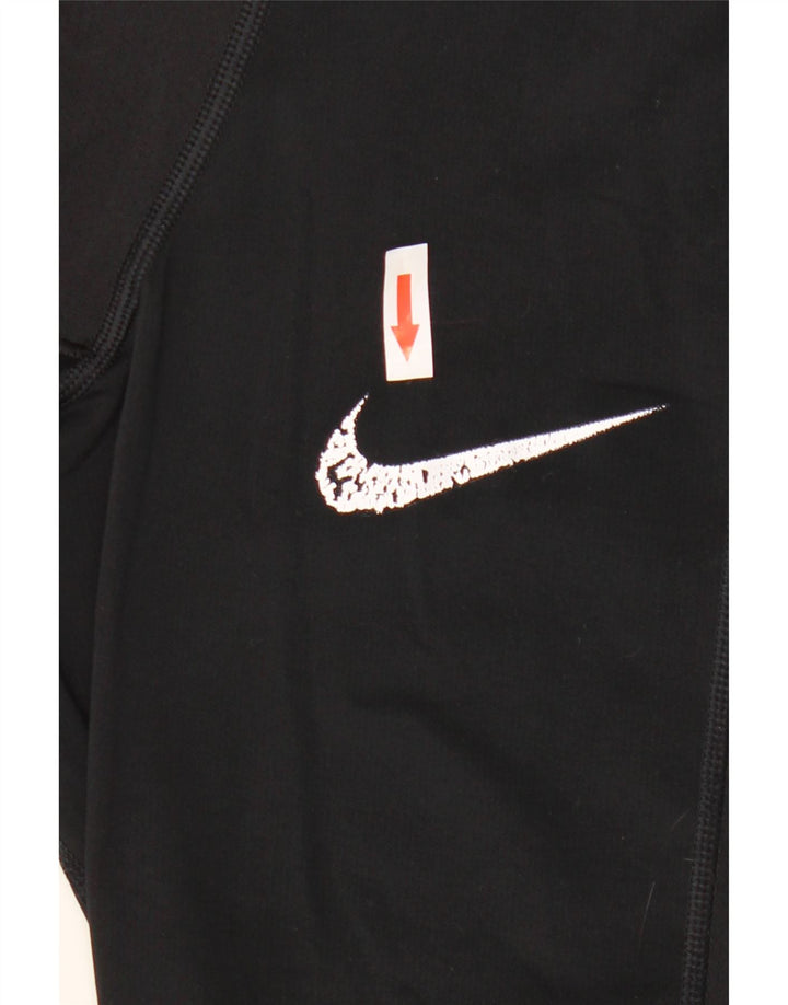 Męskie legginsy Nike o dopasowanym kroju z grafiką, średni czarny poliester