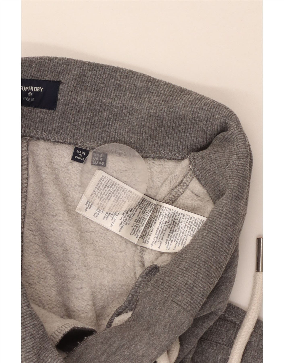 Damskie spodnie dresowe SUPERDRY z grafiką Joggers UK 8 Small Grey Flecked