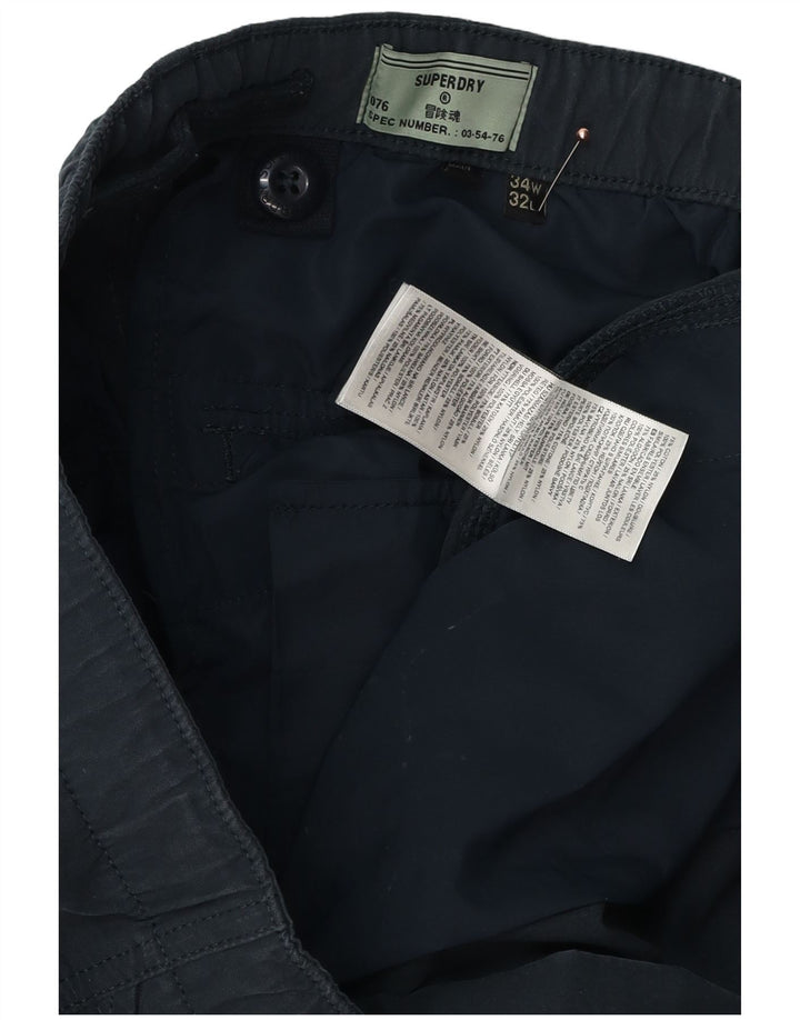 Męskie zwężane spodnie cargo SUPERDRY W34 L32 Granatowa bawełna