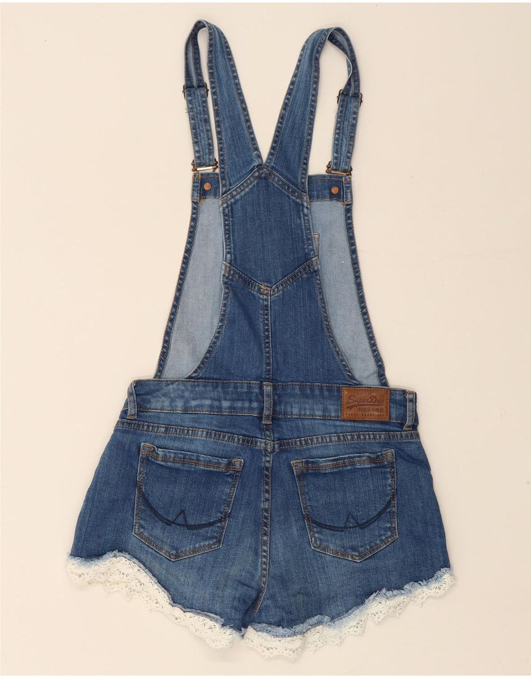 SUPERDRY Damskie spodenki jeansowe ogrodniczki XS W25 Niebieska bawełna