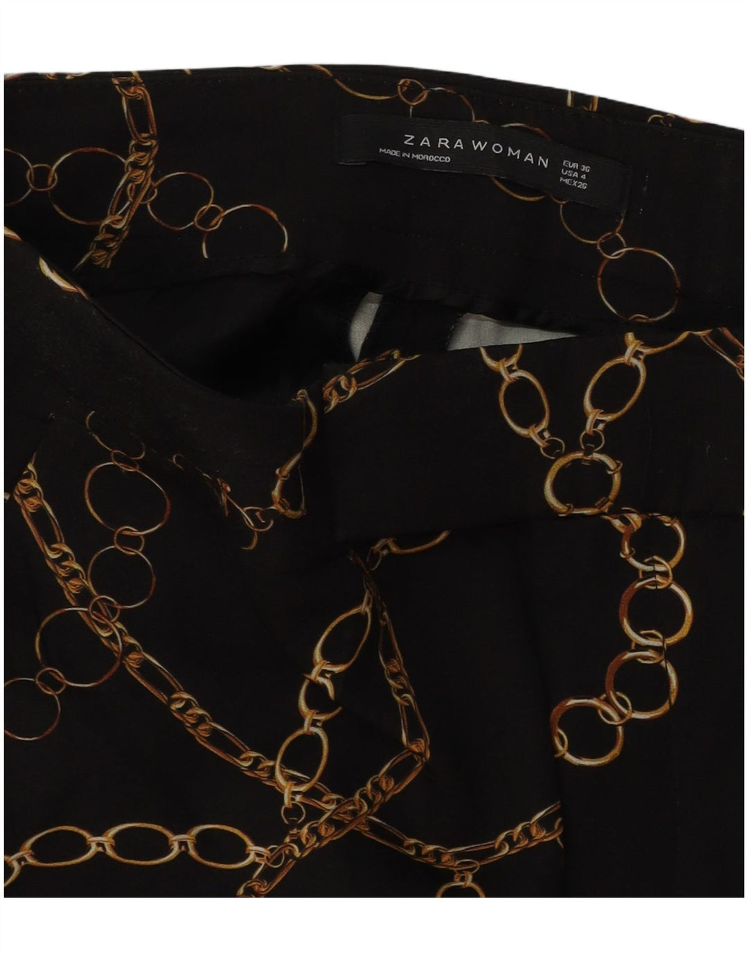 Damskie spodnie codzienne ZARA w abstrakcyjny wzór EU 36 XS W26 L27 czarne