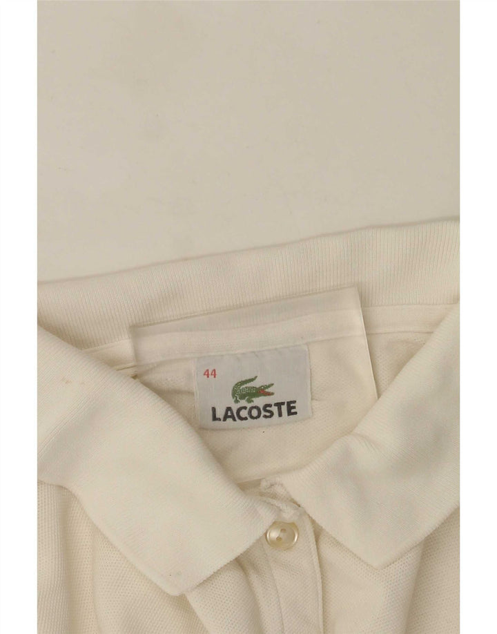 Damska koszulka polo Lacoste z długim rękawem, rozmiar 44, duża biała