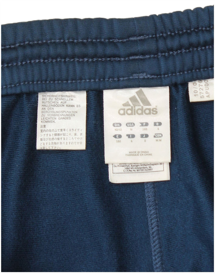 Męskie spodnie dresowe Adidas UK 40/42 Średni niebieski poliester