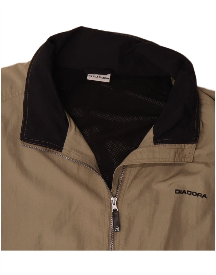 Męska kurtka przeciwdeszczowa Diadora UK 42 XL Beżowy poliamid