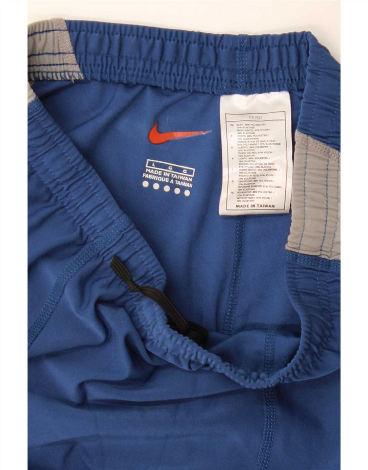 Damskie spodnie dresowe Nike UK 14, duże, niebieskie, poliestrowe bloki kolorów