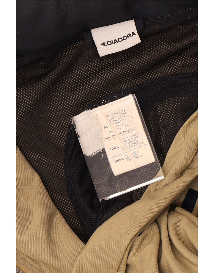 Męska kurtka przeciwdeszczowa Diadora UK 44 2XL Beżowy poliamid