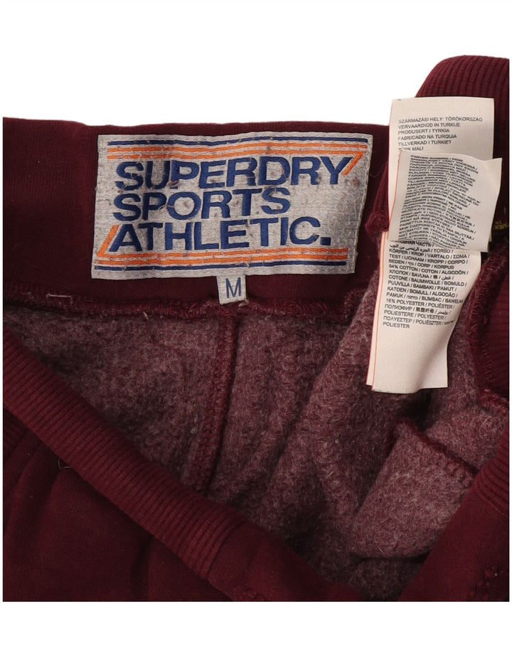 Męskie spodnie dresowe Superdry z grafiką, w kolorze średniego burgunda