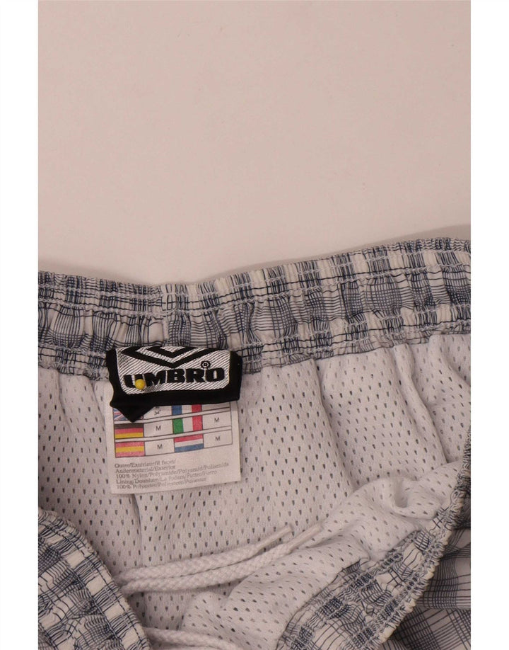 Męskie spodenki sportowe Umbro w kolorze średniego granatu, nylon w kratkę