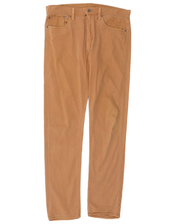 Męskie jeansy Levi's o regularnym kroju, zwężane W32 L34, beżowa bawełna