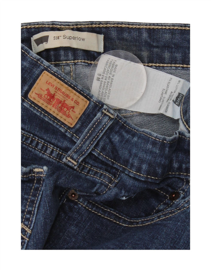 Damskie jeansy Levi's 518 Super Low Bootcut US 9 Medium W30 L31 Niebieska bawełna