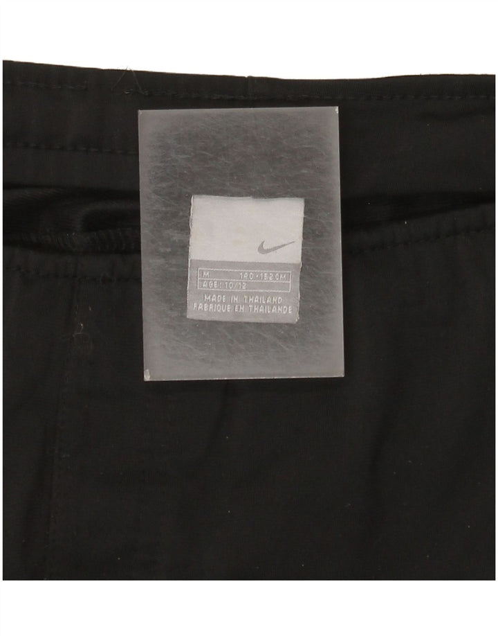 Chłopięce spodnie dresowe Nike 10-11 lat, średnie czarne
