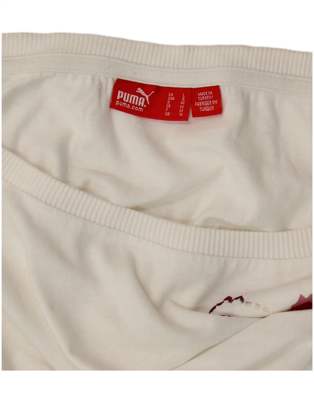 Damska koszulka z grafiką PUMA Top UK 14 Średnia biel