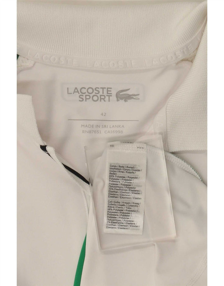 Damska koszulka polo Lacoste, rozmiar 42, duża, biała, poliestrowa z blokami kolorów