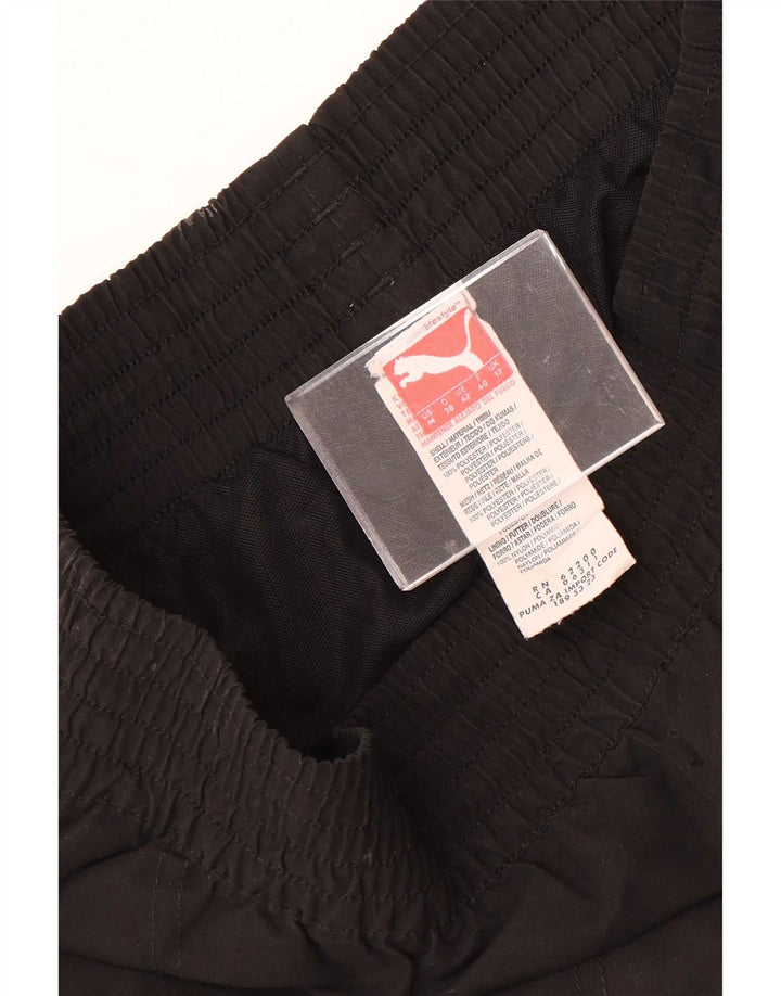 Damskie spodnie dresowe Puma Joggers UK 12 Średni czarny poliester