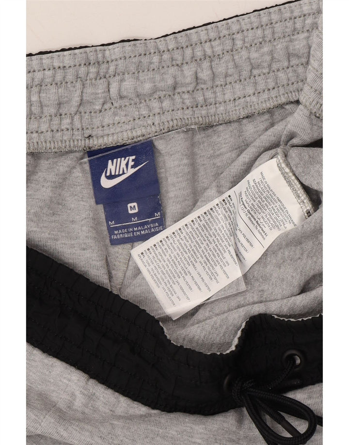 NIKE Mens Tracksuit Trousers Joggers Medium  Grey Cotton Vintage Nike and Second-Hand Nike from Messina Hembry 