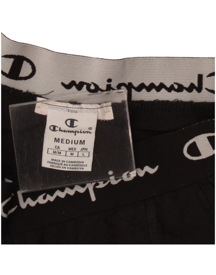 Damskie spodnie dresowe CHAMPION Graphic UK 14 Medium Black