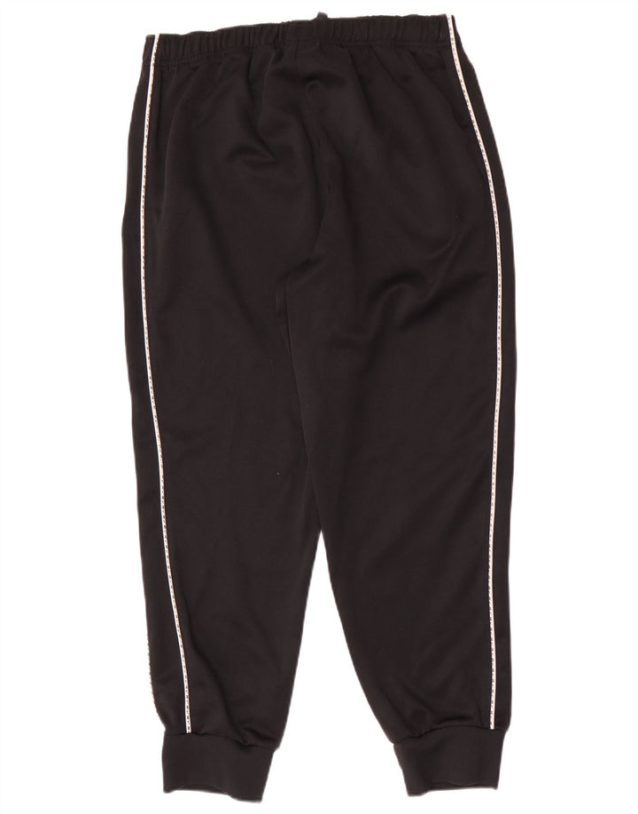 Męskie spodnie dresowe Nike Graphic, joggery, średni czarny poliester