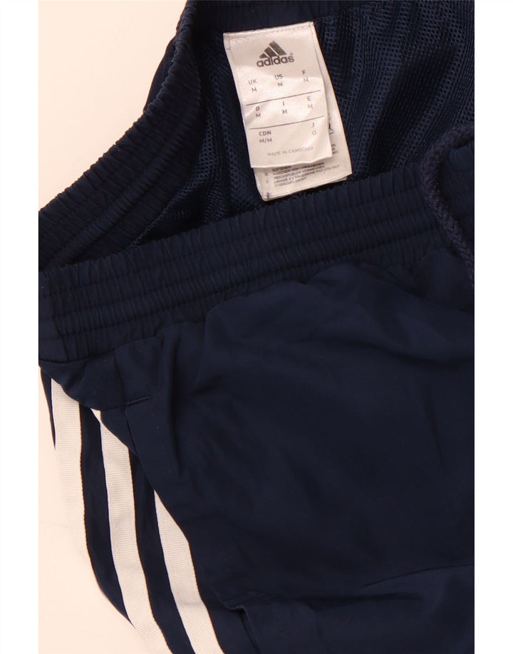 Damskie spodnie dresowe ADIDAS Joggery Średni granatowy poliester sportowy