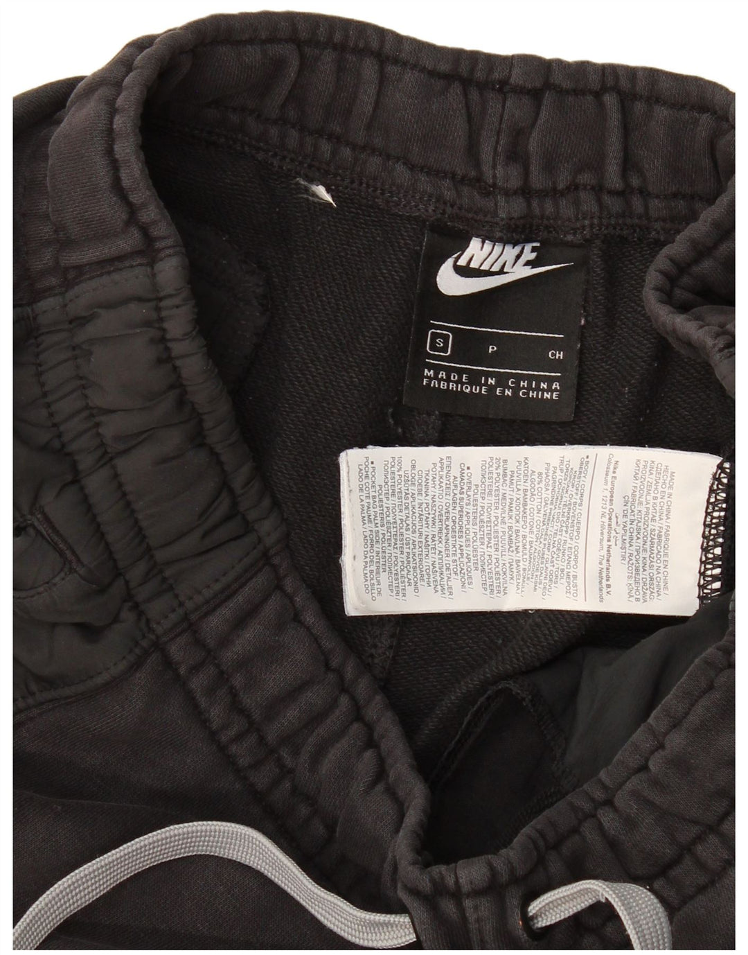 Męskie spodnie dresowe Nike z grafiką, małe, czarne, bawełniane