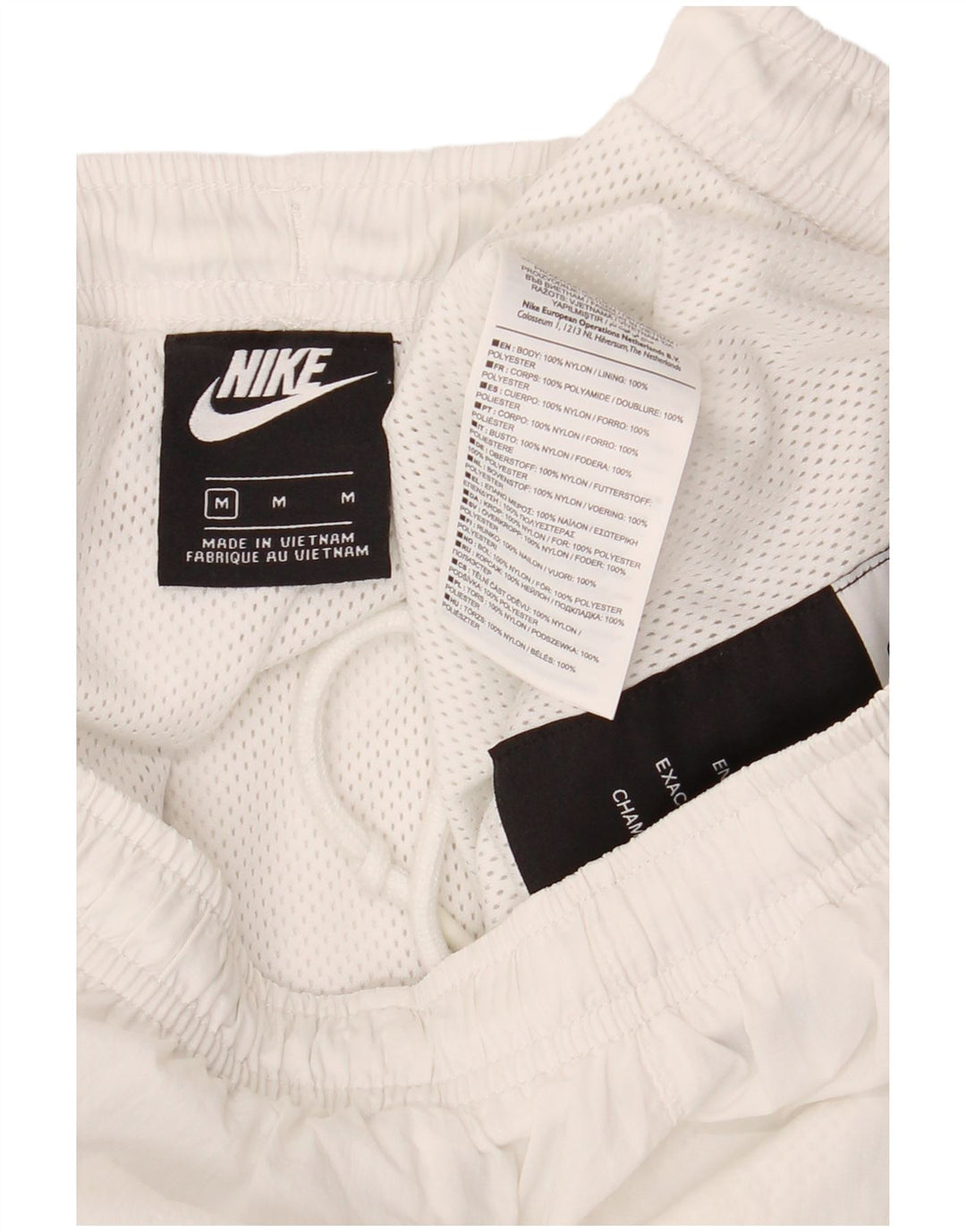 Męskie spodnie dresowe Nike, joggery, nylon w kolorze średniej bieli