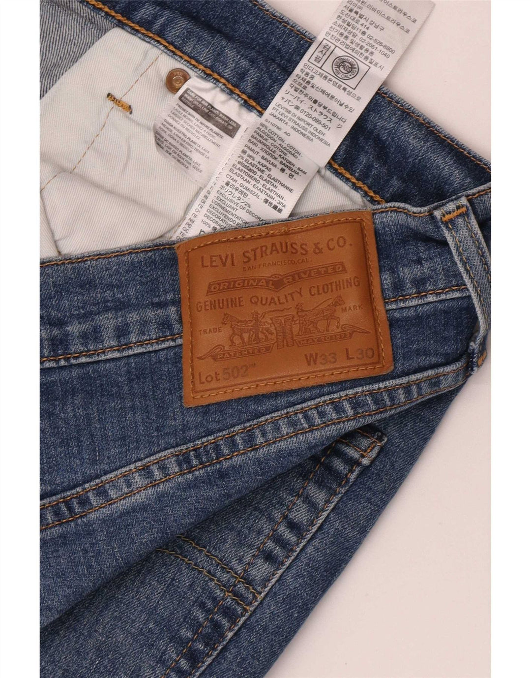 Męskie jeansy Levi's 502 Tapered W33 L30 Niebieskie bawełniane