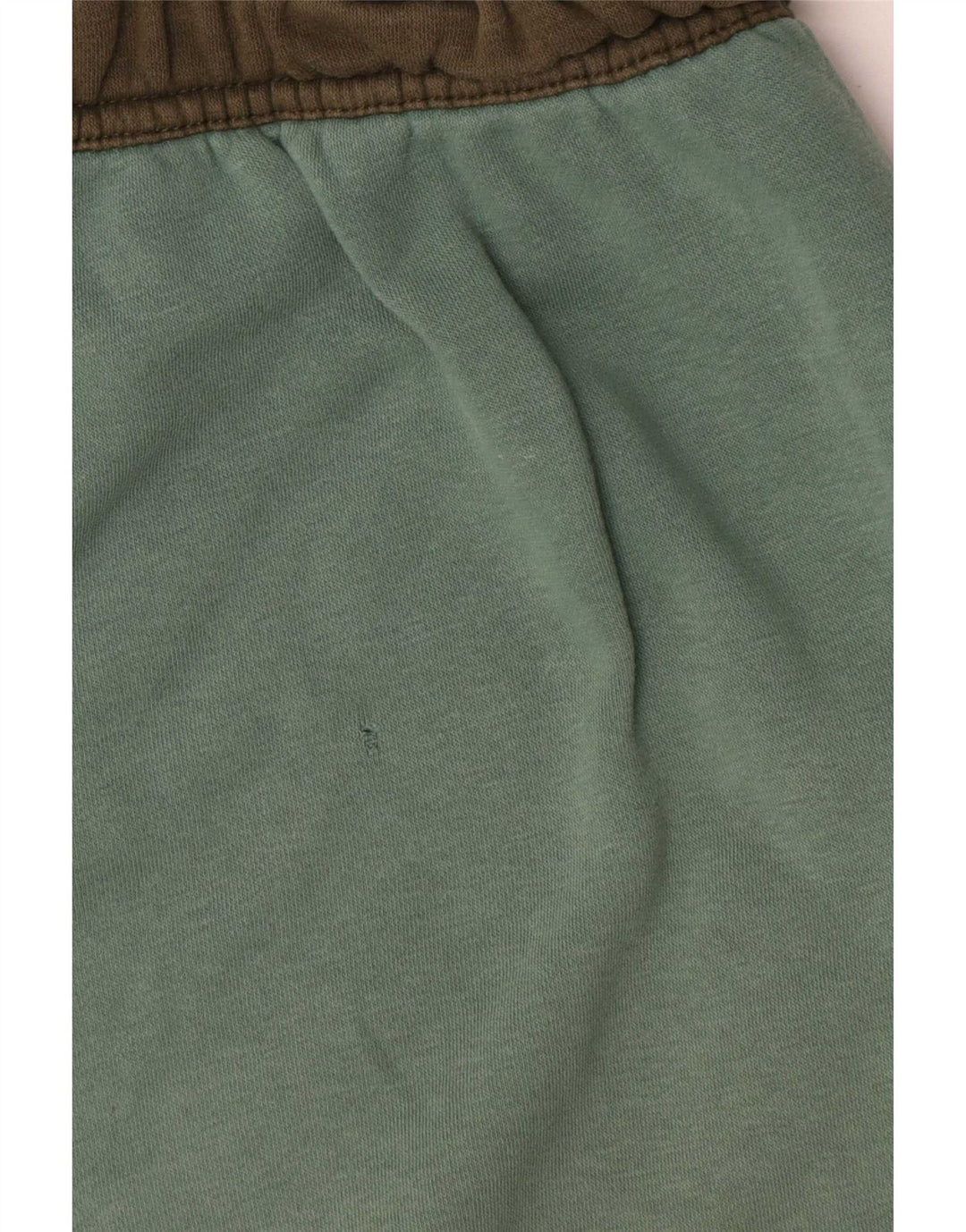 Męskie spodnie dresowe Nike Cargo Joggers w kolorze średniej zieleni