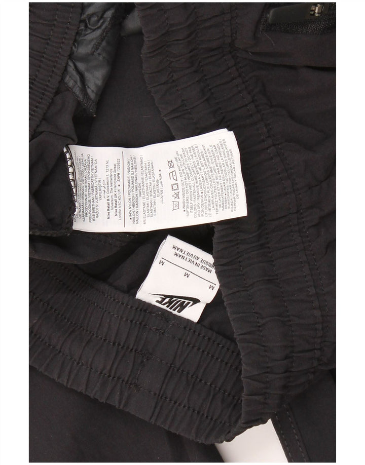 Męskie spodnie dresowe NIKE Cargo Joggery Średni czarny nylon