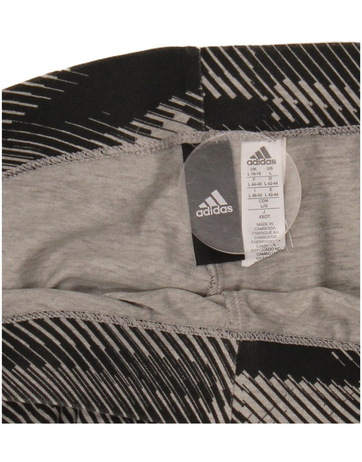 Damskie legginsy ADIDAS z grafiką UK 16/18, duże, czarne, bawełniane w paski