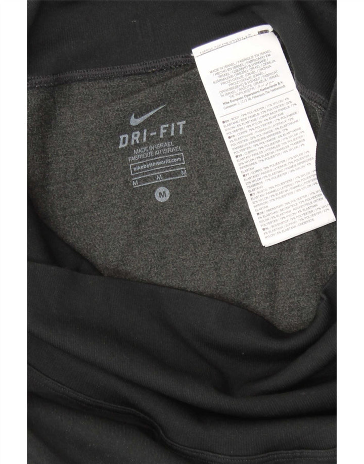 Damskie legginsy Nike Dri Fit UK 12, poliester w kolorze średniej czarnej kolorystyki