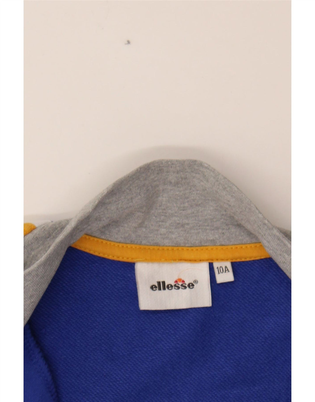 ELLESSE Boys Graphic Tracksuit Top Jacket 9-10 Years Blue Colourblock Vintage Ellesse and Second-Hand Ellesse from Messina Hembry 
