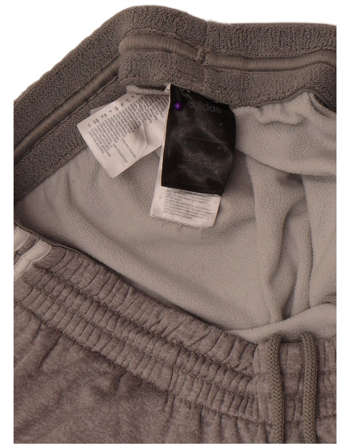 Adidas Męskie spodnie dresowe Climawarm Joggers Średni szary poliester