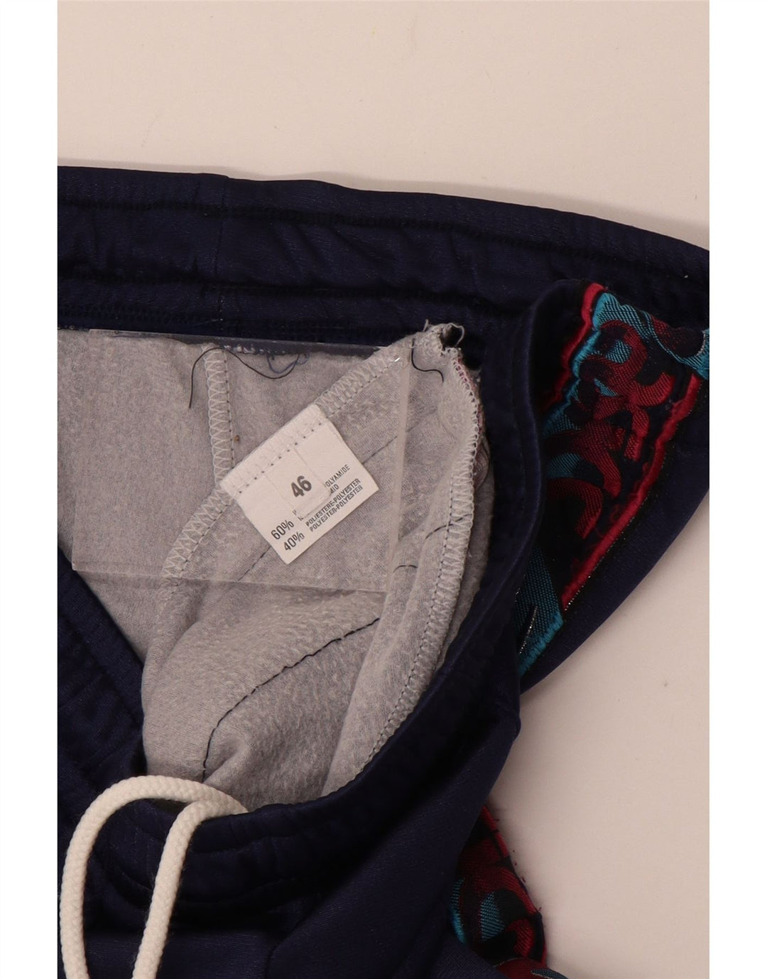 Damskie spodnie dresowe ASICS IT 46, duże granatowe, poliamidowe