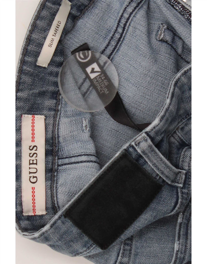 Męskie dżinsy Guess Slim Tapered W34 L31 Niebieskie