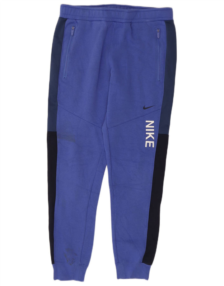 Męskie spodnie dresowe Nike, joggery, bawełna w kolorze średniego błękitu