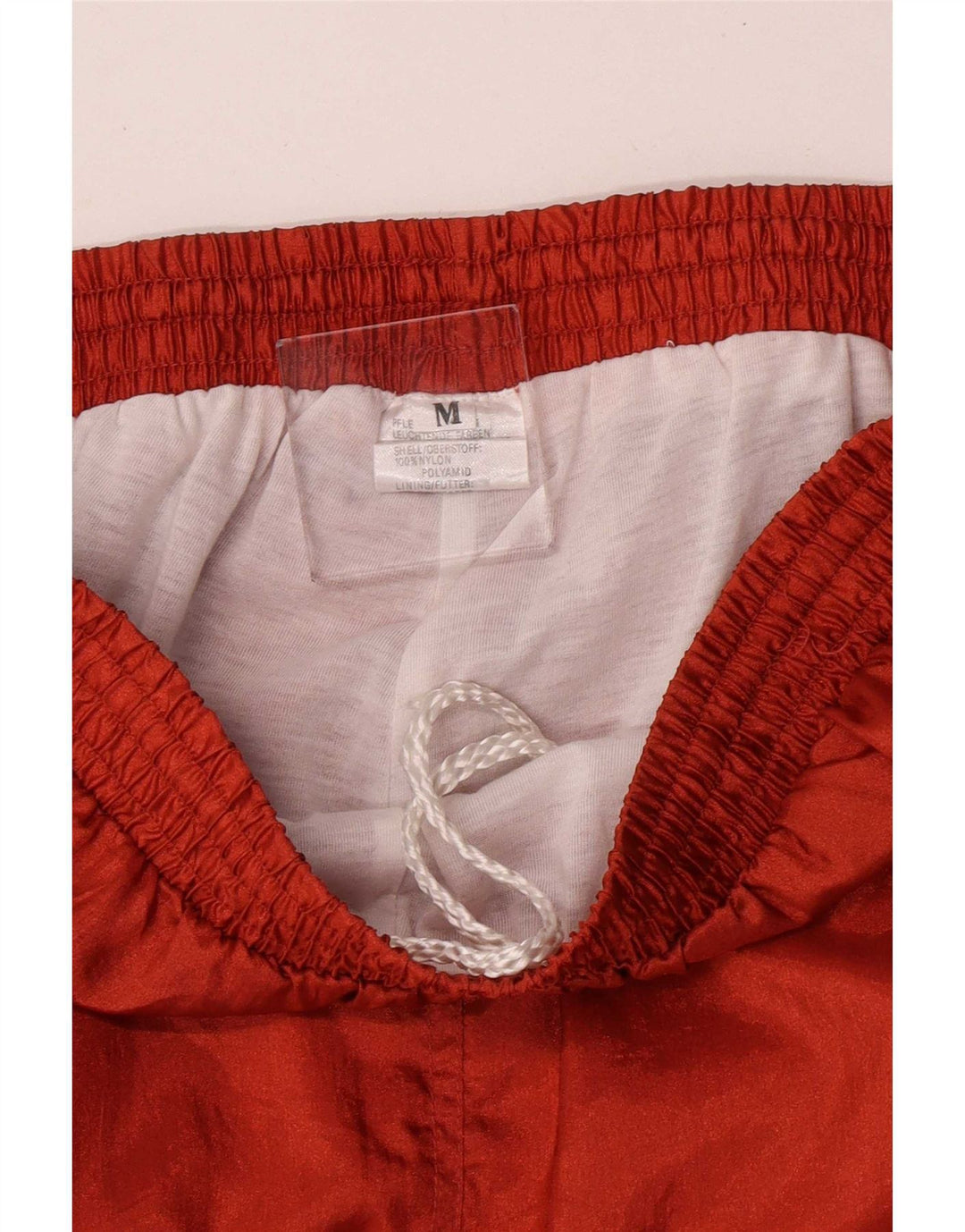 Męskie spodnie dresowe VINTAGE Joggery Średni pomarańczowy nylon
