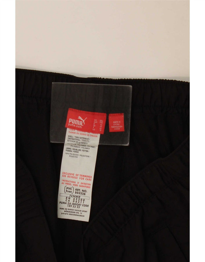 Damskie spodnie dresowe Puma Cargo UK 18 XL, czarny poliester