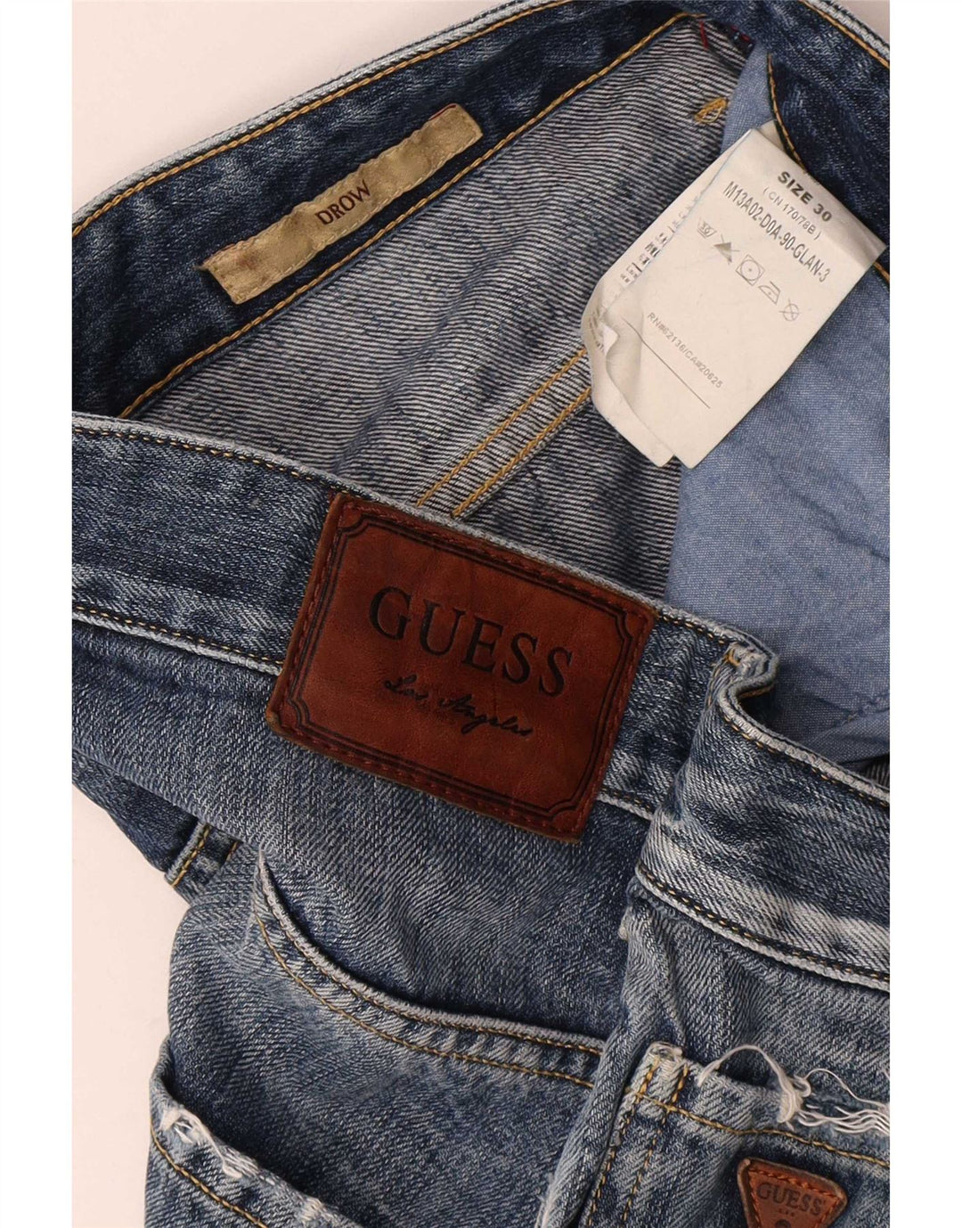 Guess Męskie jeansy slim W30 L34 Niebieskie bawełniane
