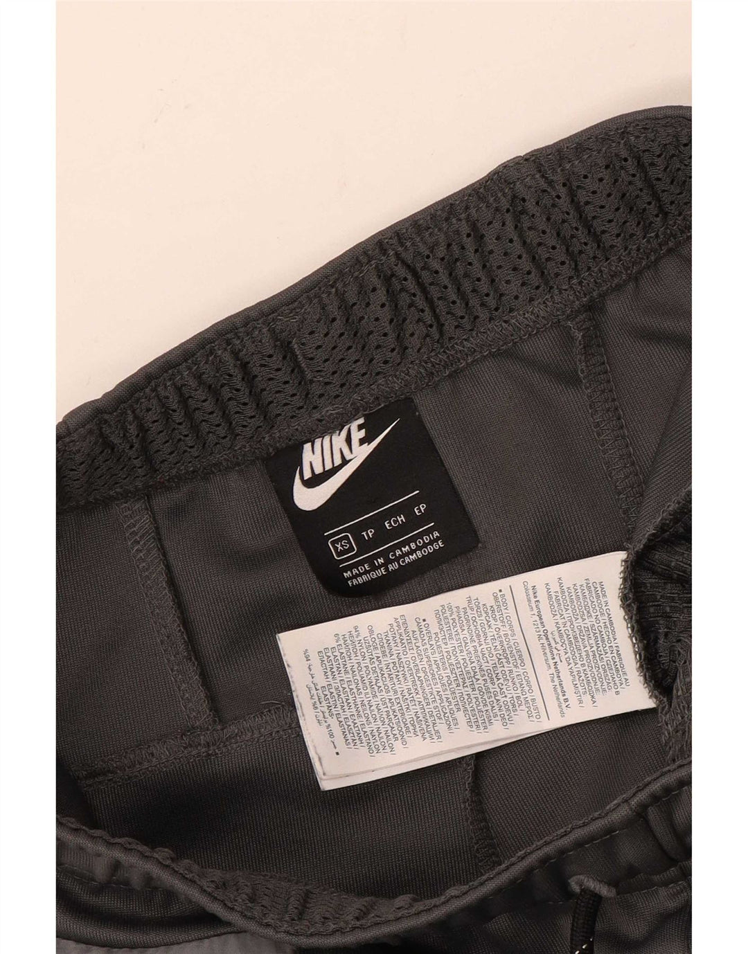 Męskie spodnie dresowe Nike Graphic Joggers XS Szary poliester z blokami kolorów