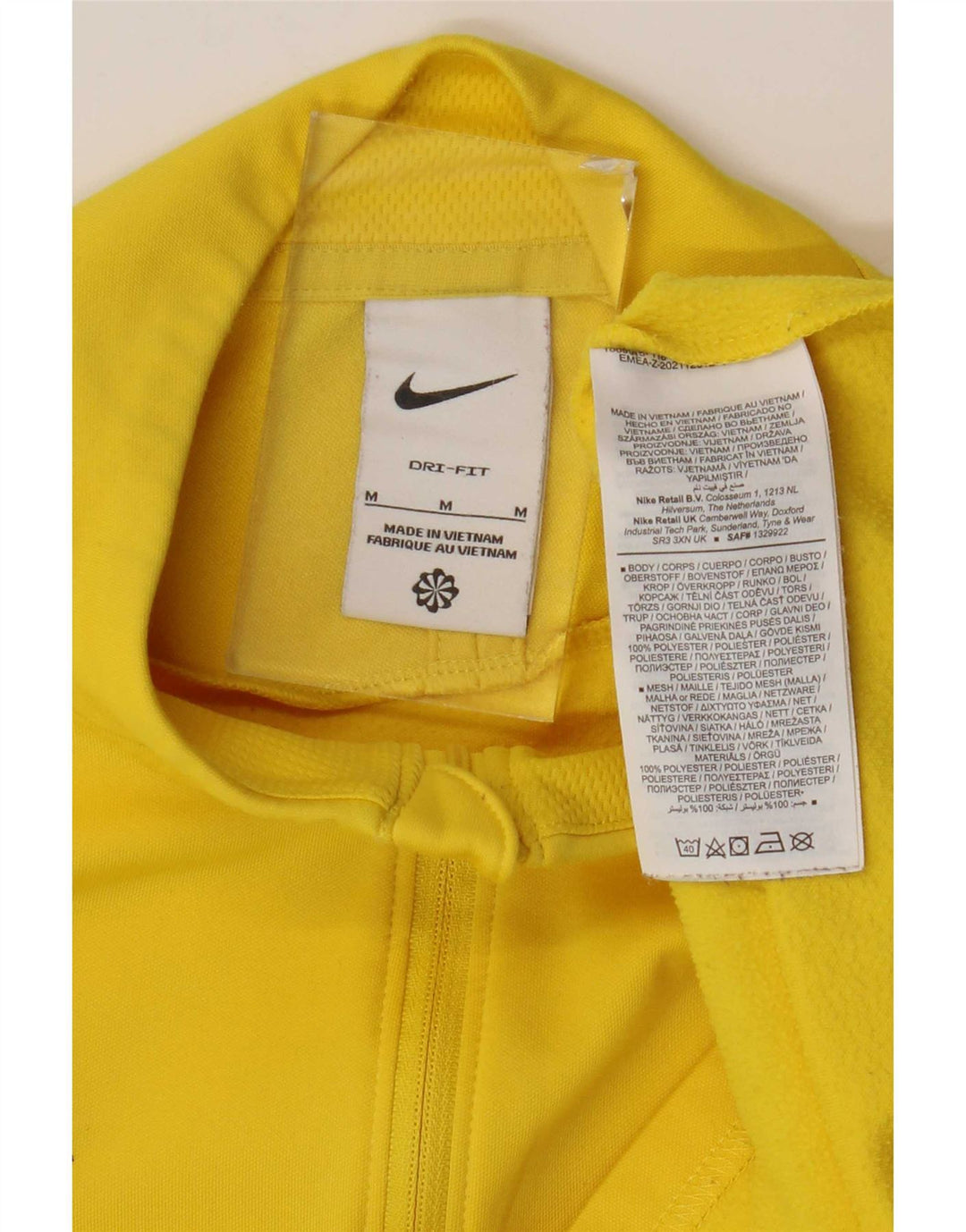 Męski dres Nike Dri Fit z zamkiem błyskawicznym na szyi i średnim żółtym blokiem kolorów