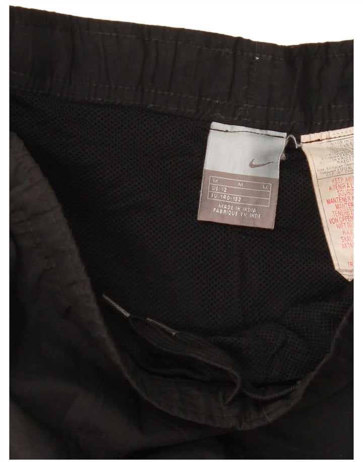 Chłopięce spodnie dresowe Nike 11-12 lat, średni czarny poliester z blokami kolorów