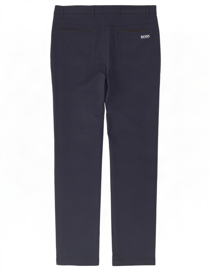 Męskie spodnie typu slim chino Hugo Boss W30 L31 granatowy poliester