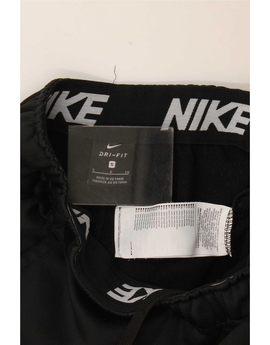 Damskie spodnie dresowe Nike Dri Fit Joggery, małe, czarne, poliestrowe