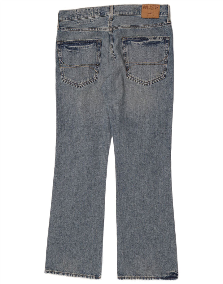 Męskie jeansy Hollister w trudnej sytuacji Bootcut W34 L32, niebieska bawełna